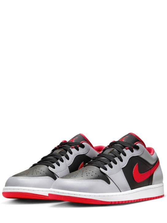 Nike: Air Jordan 1 Low sneakers - Black/Fire Red - men_1 | Luisa Via Roma