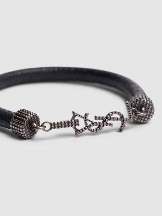 Saint Laurent: YSL closure leather cord bracelet - Black - men_1 | Luisa Via Roma