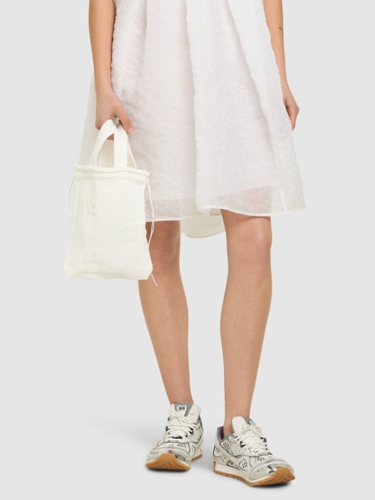 Cecilie Bahnsen: Ute knit drawstring bag - White - women_1 | Luisa Via Roma