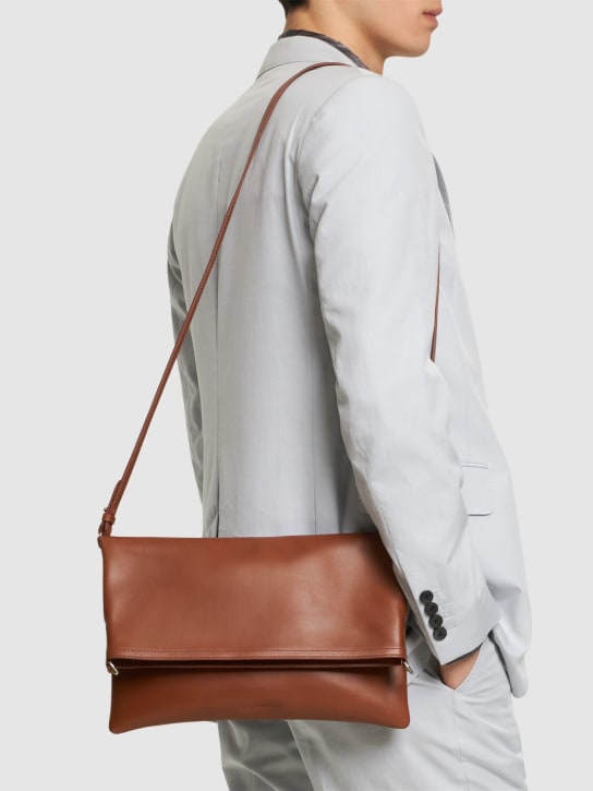 Dries Van Noten: Flat leather crossbody bag - Tan - men_1 | Luisa Via Roma