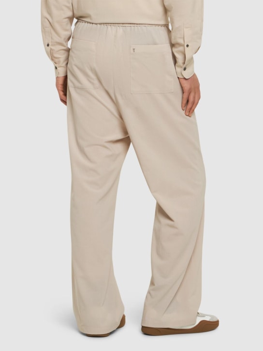 AMI Paris: Cotton jogging pants - men_2 | Luisa Via Roma