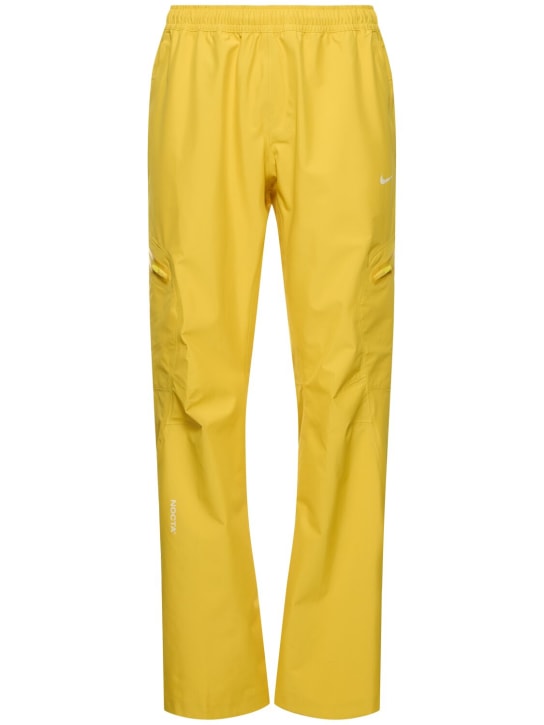 Nike: Nocta tech pants - Yellow/White - men_0 | Luisa Via Roma