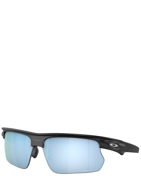 Oakley: Rechteckige Sonnenbrille „Bisphaera“ - Blau /Schwarz - women_1 | Luisa Via Roma