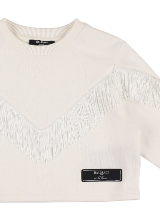 Balmain: Sweat-shirt court en coton à franges - Blanc - kids-girls_1 | Luisa Via Roma