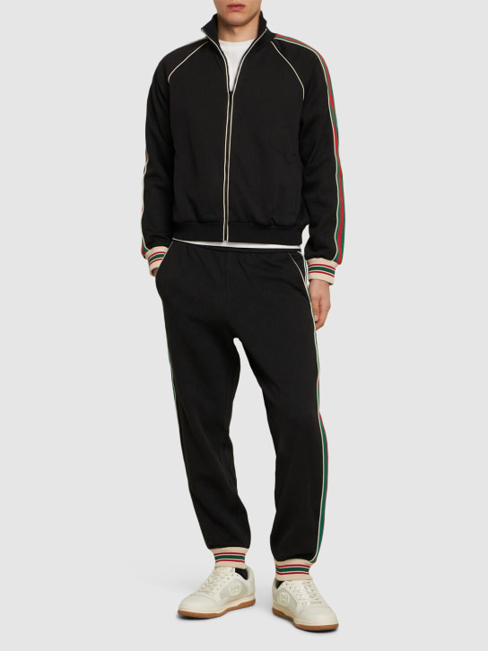 Gucci: GG jersey jacquard jogging pants - Black - men_1 | Luisa Via Roma