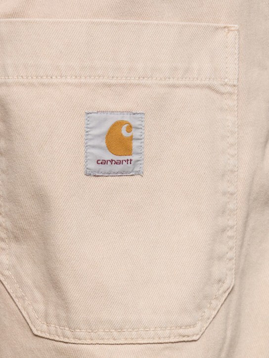Carhartt WIP: Garrison stone dyed denim jeans - men_3 | Luisa Via Roma