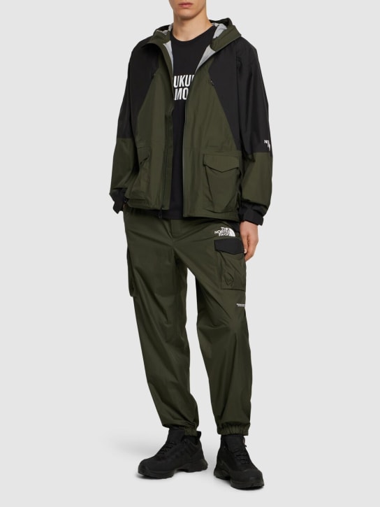The North Face: Soukuu packable light shell jacket - Forest/Black - men_1 | Luisa Via Roma