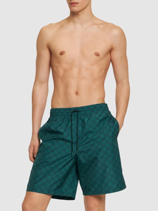 Gucci: GG nylon swim shorts - Verde - men_1 | Luisa Via Roma