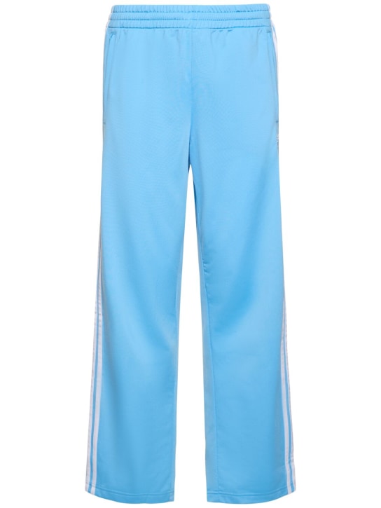 adidas Originals: Pantalon de survêtement en textile tech Firebird - Bleu - men_0 | Luisa Via Roma