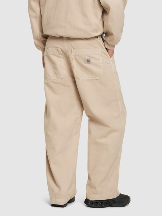 Carhartt WIP: Garrison stone dyed denim jeans - men_2 | Luisa Via Roma
