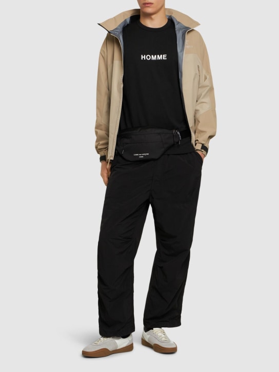 Comme des Garçons Homme: Camiseta de algodón estampado con logo - Negro - men_1 | Luisa Via Roma