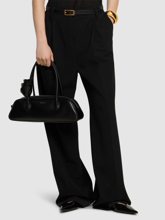 Magda Butrym: Brigitte Trapeze leather top handle bag - Black - women_1 | Luisa Via Roma