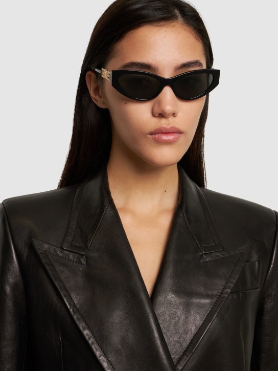 Versace: Katzenaugen-Sonnenbrille aus Acetat - Gold/Schwarz - women_1 | Luisa Via Roma