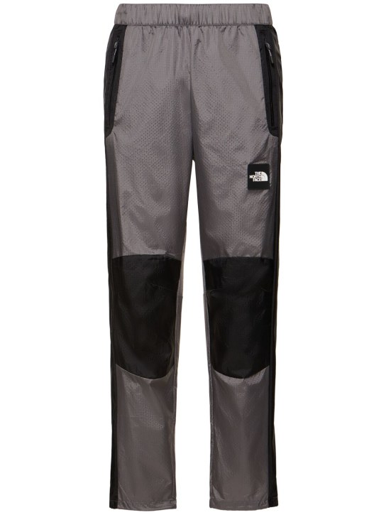 The North Face: Wind shell pants - Smoked Pearl - men_0 | Luisa Via Roma