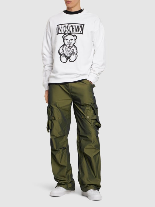 Moschino: Teddy print cotton crewneck sweatshirt - men_1 | Luisa Via Roma