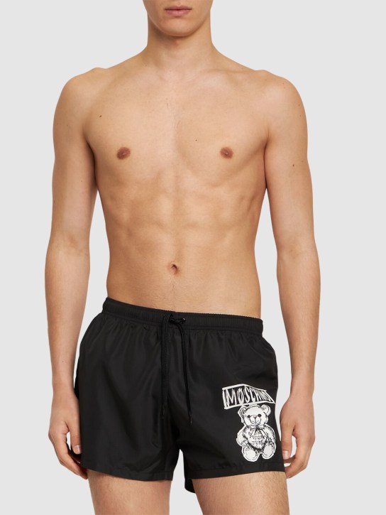 Moschino: Teddy print swim shorts - Black - men_1 | Luisa Via Roma