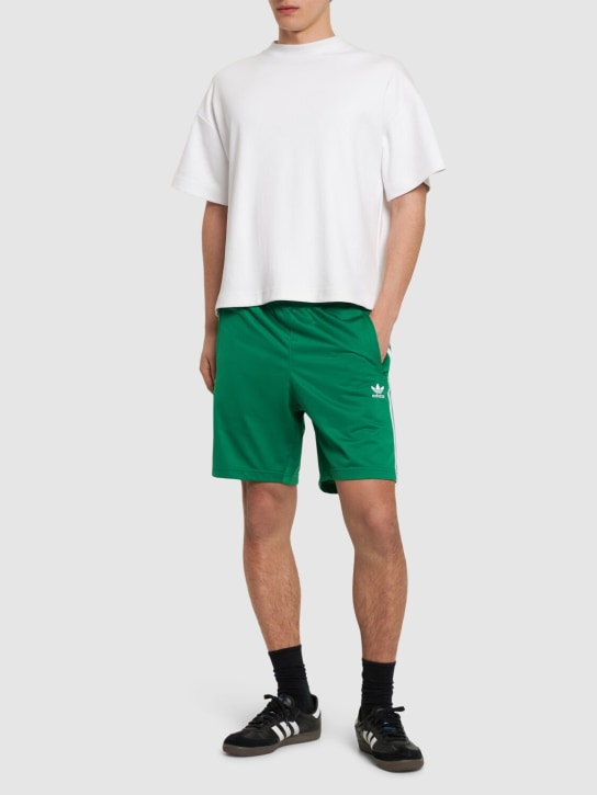adidas Originals: Shorts de techno reciclado - Verde/Blanco - men_1 | Luisa Via Roma