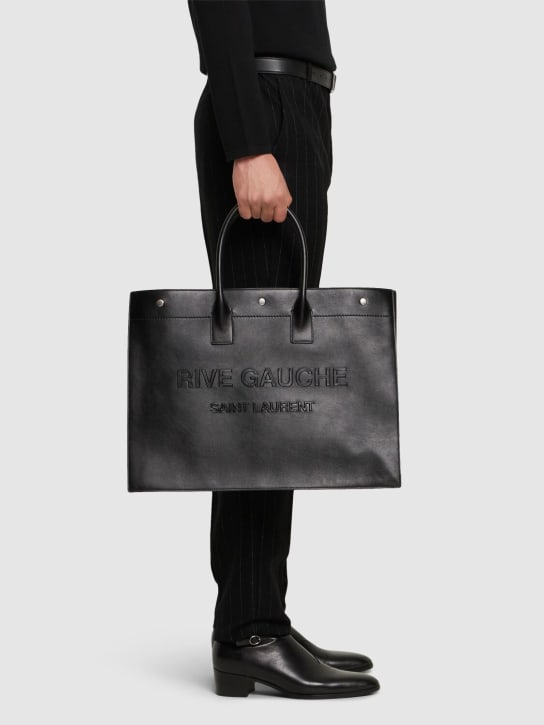 Saint Laurent: Large Rive Gauche leather tote bag - Siyah - men_1 | Luisa Via Roma