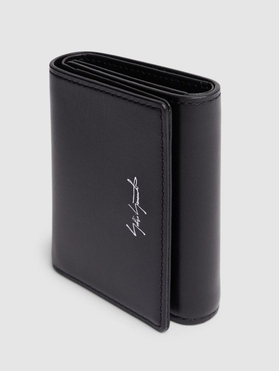 Yohji Yamamoto: Trifold leather wallet - men_1 | Luisa Via Roma