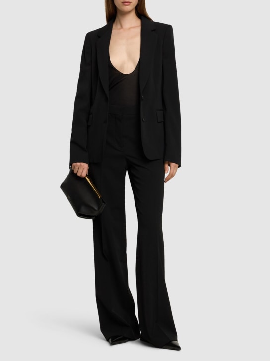 Stella McCartney: Pantalon évasé en sergé de laine taille haute - Noir - women_1 | Luisa Via Roma