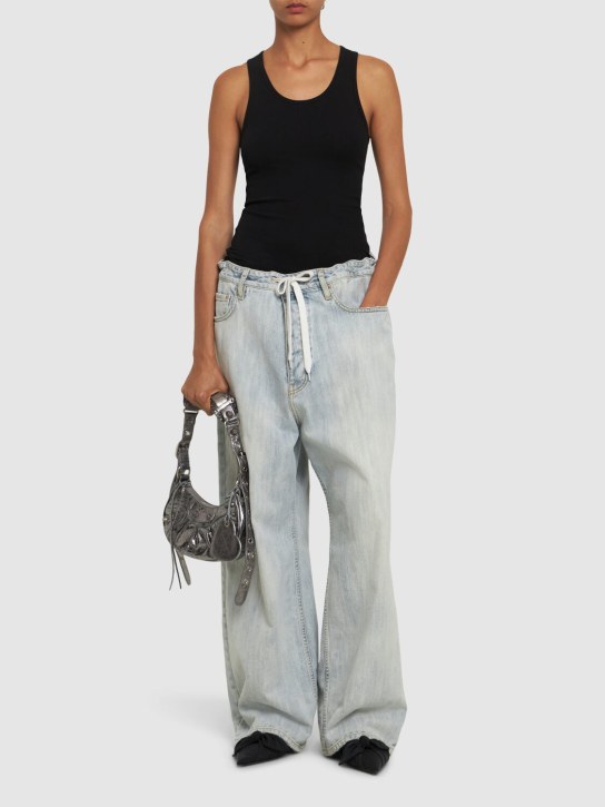 Balenciaga: Jeans baggy de denim de algodón - Bleached Ring - women_1 | Luisa Via Roma