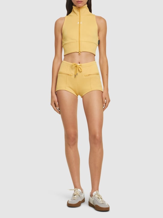 Courreges: Interlock tracksuit mini shorts - Yellow - women_1 | Luisa Via Roma