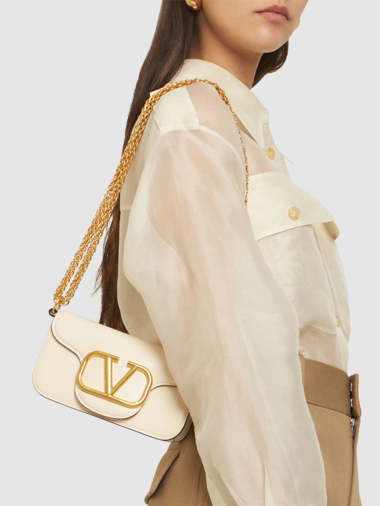 Valentino Garavani: Small Locò leather shoulder bag - Light Ivory - women_1 | Luisa Via Roma
