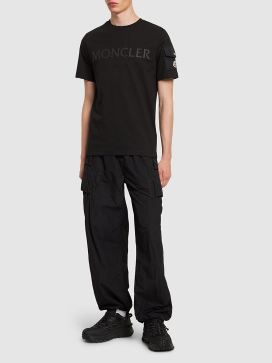 Moncler: Laminated logo cotton t-shirt - Black - men_1 | Luisa Via Roma