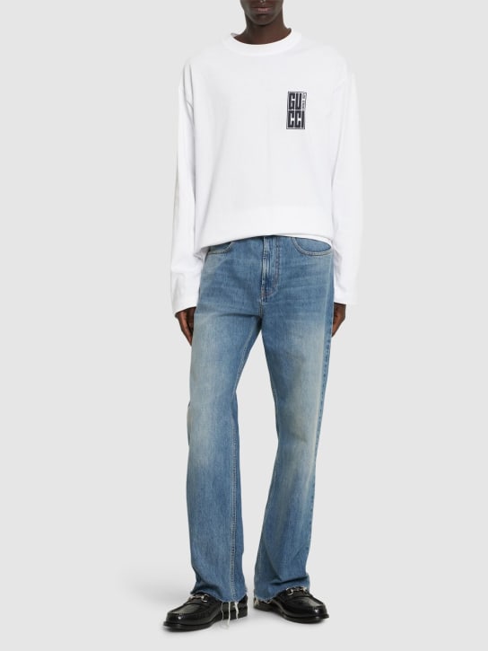 Gucci: Cotton denim jeans w/ raw cut hem - Açık Mavi - men_1 | Luisa Via Roma