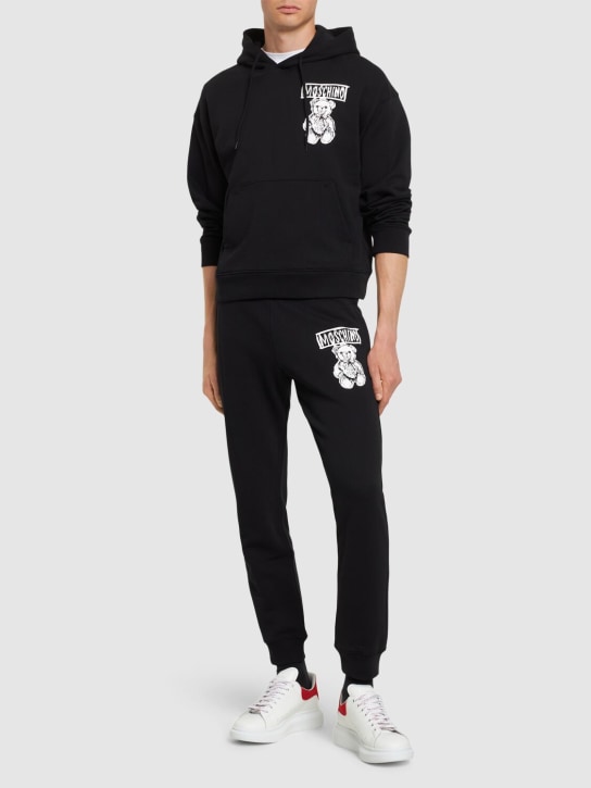 Moschino: Teddy print cotton hoodie - men_1 | Luisa Via Roma