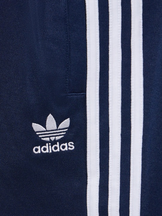adidas Originals: Baggy track pants - Mavi/Beyaz - men_1 | Luisa Via Roma