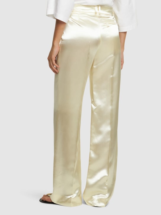 The Row: Encore midrise satin flared pants - Ivory - women_2 | Luisa Via Roma