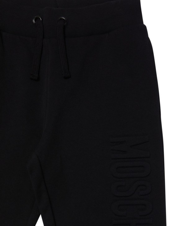 Moschino: Pantaloni in felpa di cotone / logo - Nero - kids-boys_1 | Luisa Via Roma