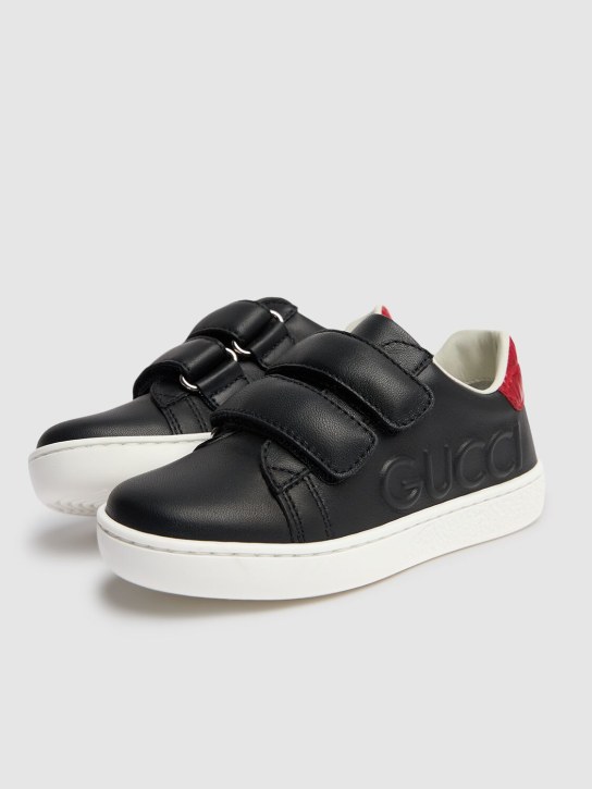 Gucci: Gucci embossed leather sneakers - Black - kids-girls_1 | Luisa Via Roma