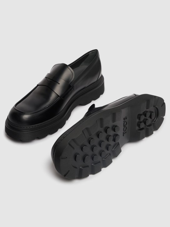 Tod's: Leather penny loafers - Black - men_4 | Luisa Via Roma