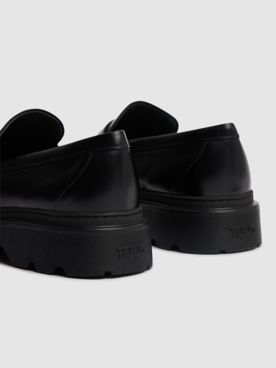 Tod's: Leather penny loafers - Black - men_3 | Luisa Via Roma