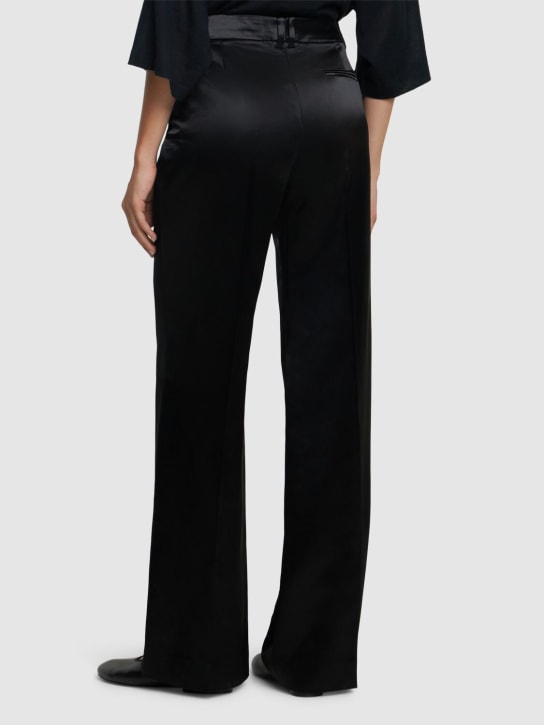 The Row: Encore midrise satin flared pants - Black - women_2 | Luisa Via Roma