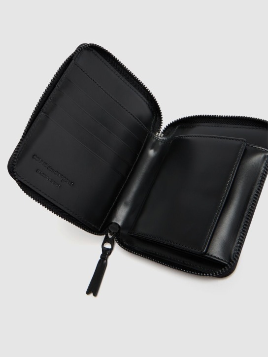 Comme des Garçons Wallet: Leather zip wallet - Black - men_1 | Luisa Via Roma