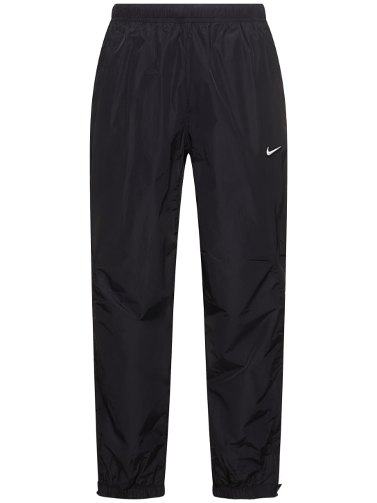 Nike: Nocta Cardinal track pants - Black - men_0 | Luisa Via Roma