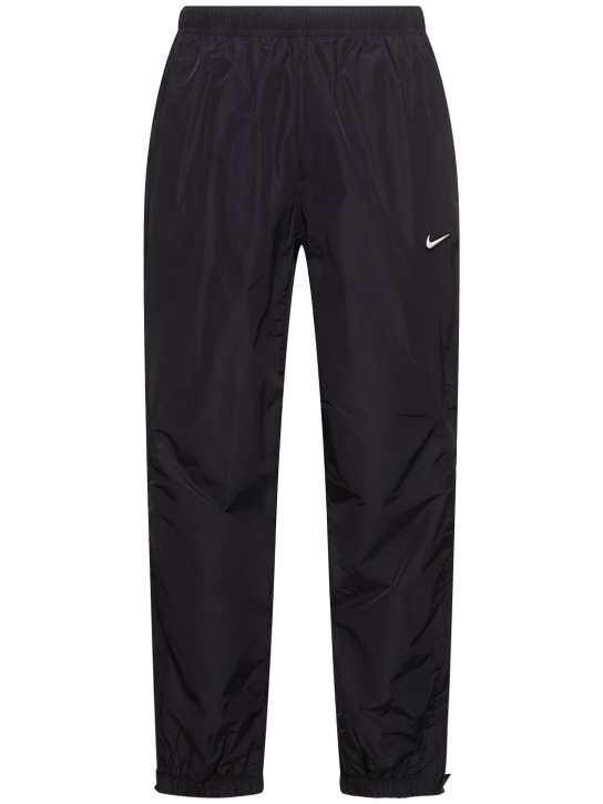 Nike: Pantalon de sport tissé Nocta - men_0 | Luisa Via Roma