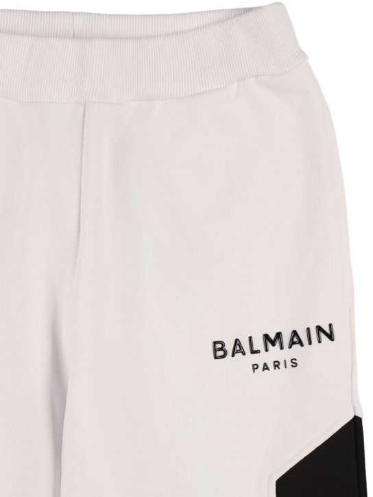 Balmain: Pantaloni in felpa di cotone con inserti in nylon - Bianco/Nero - kids-boys_1 | Luisa Via Roma