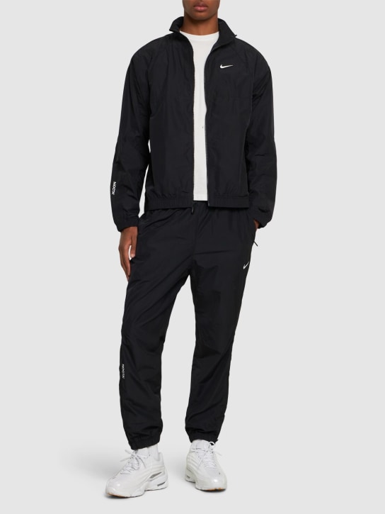 Nike: Nocta Cardinal track pants - Black - men_1 | Luisa Via Roma