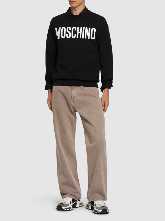 Moschino: Logo print cotton crewneck sweatshirt - men_1 | Luisa Via Roma