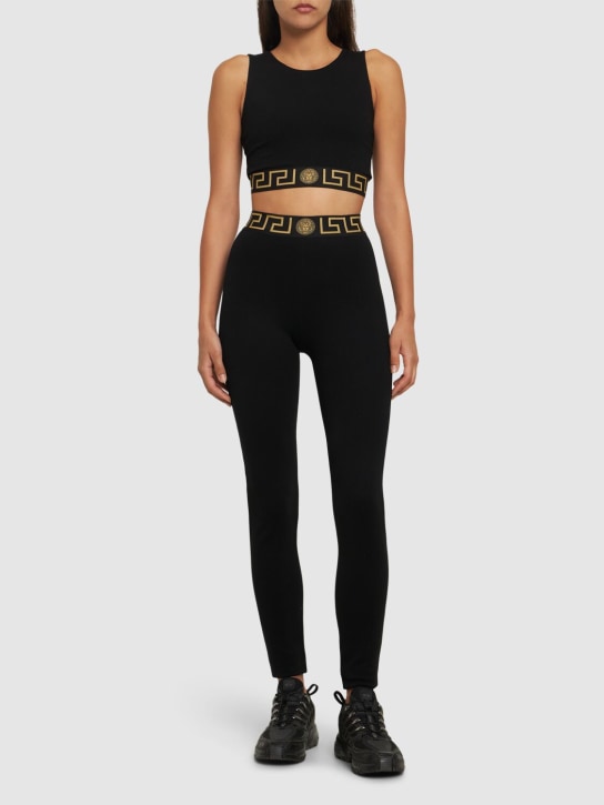 Versace: Logo jersey leggings - Black - women_1 | Luisa Via Roma