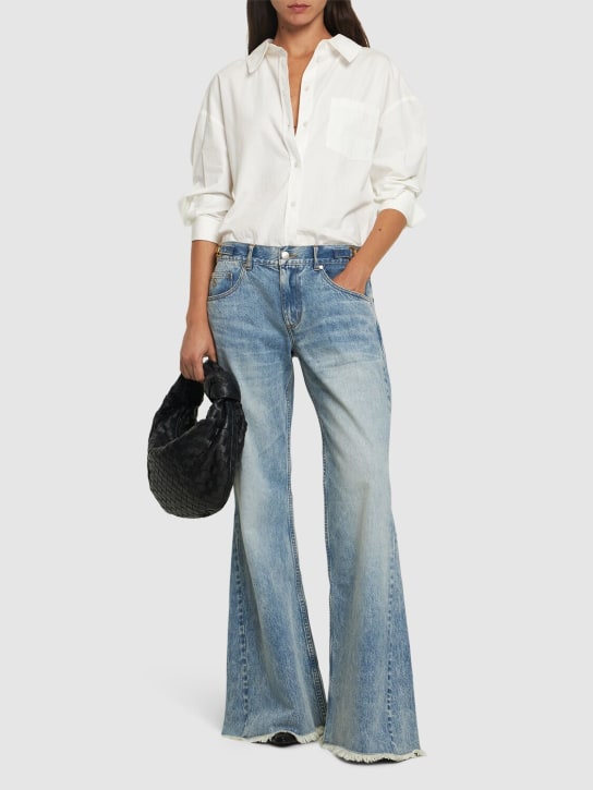 Stella McCartney: Jean évasé en denim embelli taille basse - Bleu Clair - women_1 | Luisa Via Roma