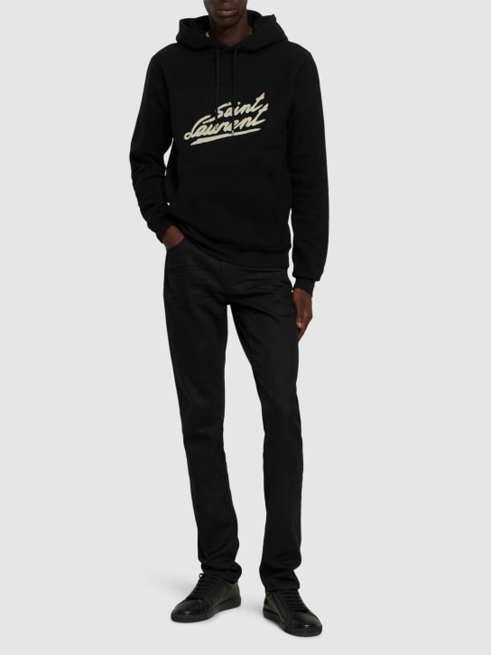 Saint Laurent: HOODIE AUS FLEECE MIT LOGODRUCK - Schwarz - men_1 | Luisa Via Roma