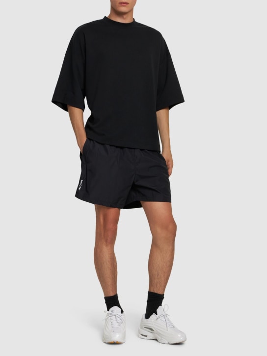 Nike: Shorts Nocta Cardinal - Nero - men_1 | Luisa Via Roma