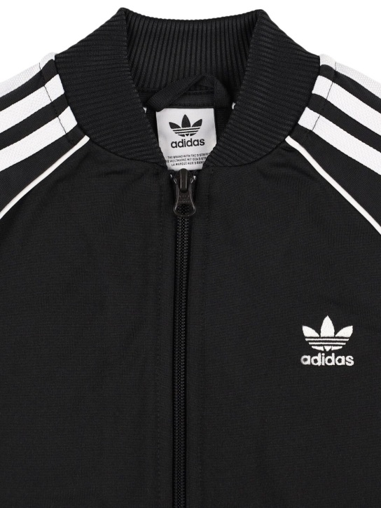 adidas Originals: Logo recycled poly tech track jacket - Black - kids-boys_1 | Luisa Via Roma