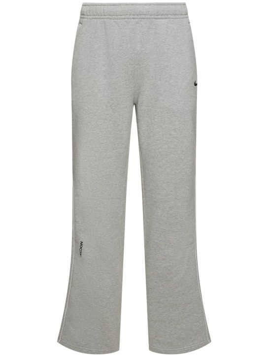 Nike: Pantaloni Nocta Cardinal Fleece - men_0 | Luisa Via Roma