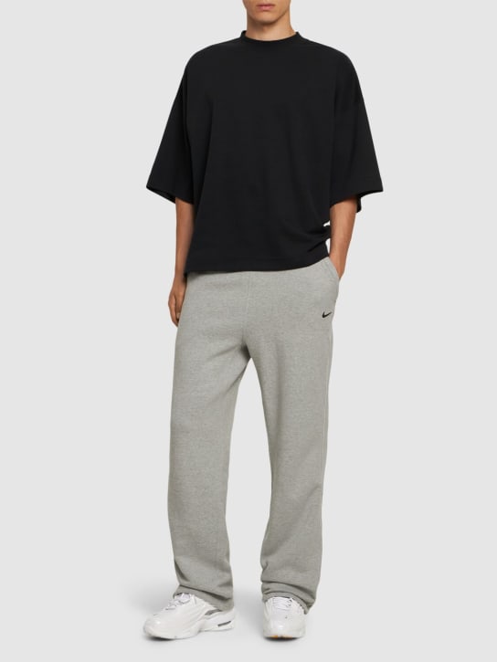 Nike: Pantaloni Nocta Cardinal Fleece - men_1 | Luisa Via Roma